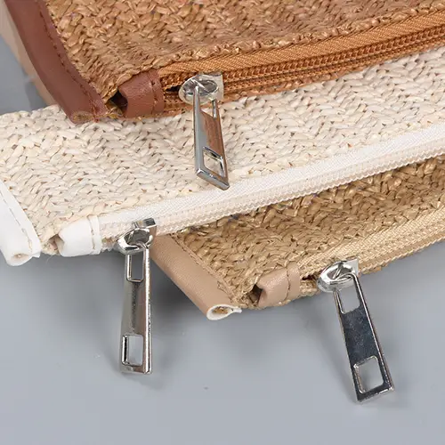 Handcrafted eco-friendly natural rattan weaving detail for high-end resort bags